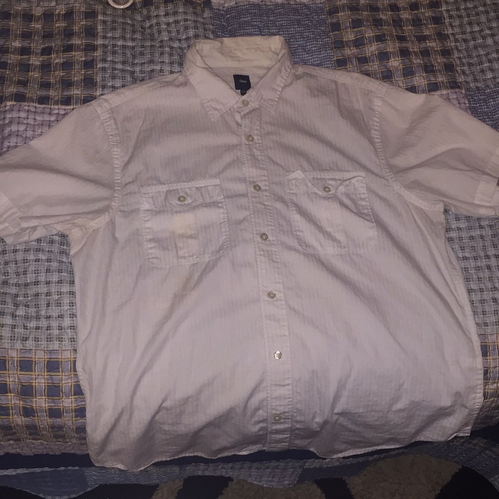 A white shirt sleeved button down